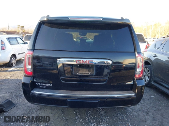 2019 GMC Yukon Denali with VIN 1GKS2CKJ2KR137664, listed as a IAAI auction lot 41335229 with 151,394 mi miles and . Bid and sale history available at DreamBid. Image 17.