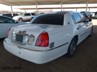 2002 Lincoln Town Car Sig. with VIN 1LNHM82W02Y626302, listed as a IAAI auction lot 41988496 with 193,346 mi miles. Bid and sale history available at carsss.com. Image 14.