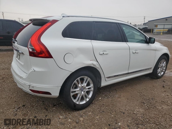 2014 Volvo XC60 3.2L z VIN YV4952DL1E2517521, wystawiony jako Copart lot #52708663 z przebiegiem 92 036 mil mil oraz Szkoda całkowita • Salvage title. Historia ofert i sprzedaży dostępna na DreamBid. Obrazek 3.