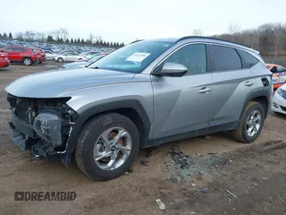 2022 Hyundai Tucson SEL z VIN 5NMJBCAE3NH070531, wystawiony jako IAAI lot #41222494 z przebiegiem 91 358 mil mil oraz . Historia ofert i sprzedaży dostępna na DreamBid. Obrazek 17.