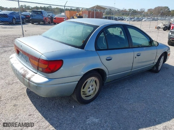 2002 Saturn SL with VIN 1G8ZJ52752Z117416, listed as a IAAI auction lot 41486679 with 318,311 mi miles. Bid and sale history available at carsss.com. Image 4.