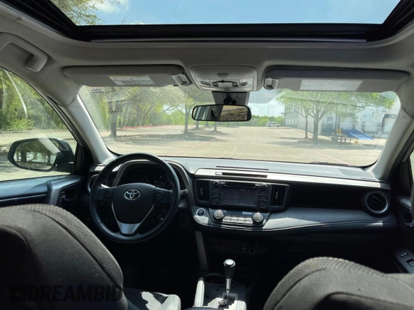 2018 Toyota RAV4 XLE with VIN 2T3WFREV8JW496356, listed as a Copart auction lot 51367765 with 71,049 mi miles and Clean Title. Bid and sale history available at DreamBid. Image 9.