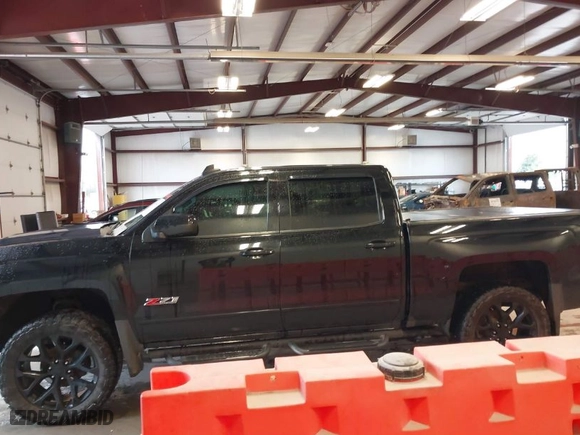 2017 Chevrolet Silverado 1500 LTZ with VIN 3GCUKSEC6HG300689, listed as a IAAI auction lot 41940491 with 165,998 mi miles. Bid and sale history available at carsss.com. Image 14.