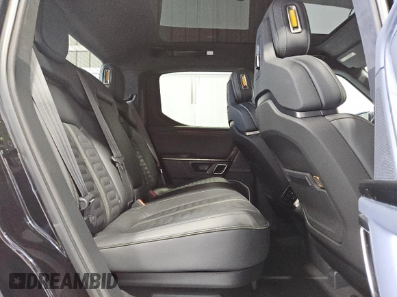 2022 Rivian R1T Adventure z VIN 7FCTGAAA5NN007486, wystawiony jako Copart lot #52649075 z przebiegiem 23 292 mil mil oraz Czysty tytuł • Clean title. Historia ofert i sprzedaży dostępna na DreamBid. Obrazek 11.