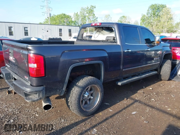 2015 GMC Sierra 2500HD SLT with VIN 1GT12ZE84FF553371, listed as a IAAI auction lot 42173249 with 247,703 mi miles and . Bid and sale history available at DreamBid. Image 4.