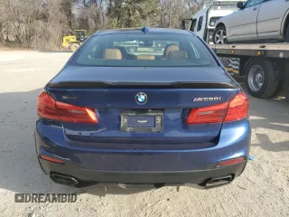 2020 BMW 5 Series M550i xDrive с VIN WBAJS7C02LCE21157, выставлен на аукционе Copart как лот 87420314 с пробегом 65 919 миль миль и Списание • Salvage title. История ставок и продаж доступна на DreamBid. Изображение 6.