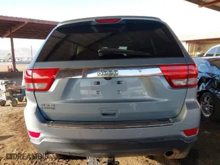 2012 Jeep Grand Cherokee Limited with VIN 1C4RJFBG2CC317363, listed as a IAAI auction lot 41689903 with 158,020 mi miles. Bid and sale history available at carsss.com. Image 17.