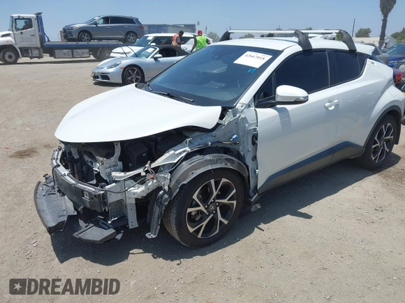 2018 Toyota C-HR XLE with VIN NMTKHMBX8JR036857, listed as a IAAI auction lot 42667018 with 63,058 mi miles and . Bid and sale history available at DreamBid. Image 18.