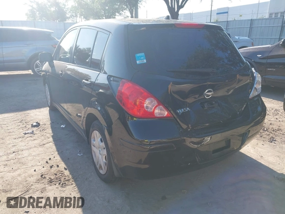 2012 Nissan Versa S with VIN 3N1BC1CP8CK201207, listed as a IAAI auction lot 42064101 with 206,514 mi miles. Bid and sale history available at carsss.com. Image 3.