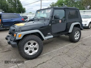 2005 Jeep Wrangler Unlimited with VIN 1J4FA44S75P358246, listed as a Copart auction lot 60958695 with 150,003 mi miles and Salvage title. Bid and sale history available at DreamBid. Image 1.