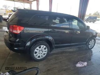 2013 Dodge Journey American Value with VIN 3C4PDCAB2DT684871, listed as a Copart auction lot 52288915 with 119,569 mi miles and Salvage title. Bid and sale history available at DreamBid. Image 3.