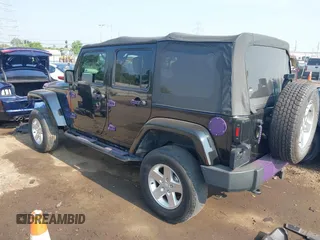 2014 Jeep Wrangler Unlimited Sahara with VIN 1C4BJWEG6EL217945, listed as a IAAI auction lot 42388477 with 61,739 mi miles and . Bid and sale history available at DreamBid. Image 3.