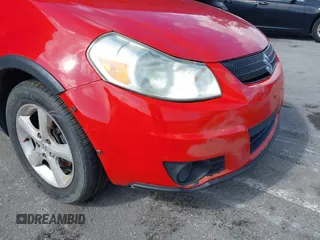 2009 Suzuki SX4 AWD with VIN JS2YB413496202028, listed as a IAAI auction lot 41930233 with 169,063 mi miles and . Bid and sale history available at DreamBid. Image 14.