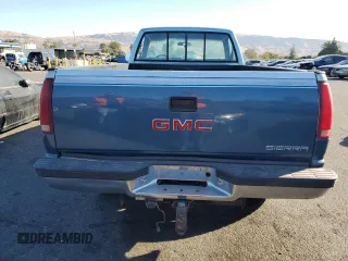 1990 GMC Sierra 2500 z VIN 1GTGK24K9LE552815, wystawiony jako Copart lot #76828874 z przebiegiem 211 977 mil mil oraz Szkody całkowita. Historia ofert i sprzedaży dostępna na DreamBid. Obrazek 6.