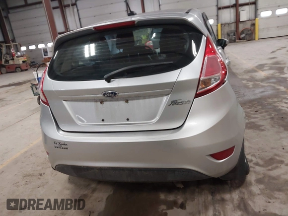2015 Ford Fiesta S z VIN 3FADP4TJ7FM220448, wystawiony jako IAAI lot #41688114 z przebiegiem 43 779 mil mil oraz . Historia ofert i sprzedaży dostępna na DreamBid. Obrazek 16.