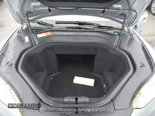 2014 Tesla Model S 60 with VIN 5YJSA1H18EFP30143, listed as a IAAI auction lot 42190505 with Not provided miles and . Bid and sale history available at DreamBid. Image 10.