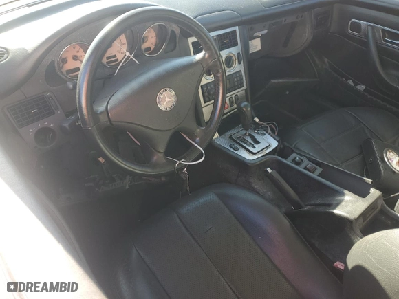 2001 Mercedes-Benz SLK-Class Kompressor with VIN WDBKK49F11F220665, listed as a Copart auction lot 88078025 with 67,564 mi miles and Salvage Title. Bid and sale history available at carsss.com. Image 8.