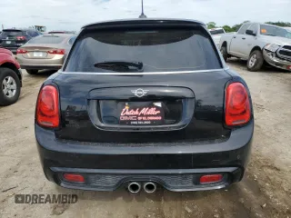 2019 MINI Hardtop 4 Door Cooper S с VIN WMWXU3C58K2H87220, выставлен на аукционе Copart как лот 55775665 с пробегом 54 404 миль миль и Списание • Salvage title. История ставок и продаж доступна на DreamBid. Изображение 6.