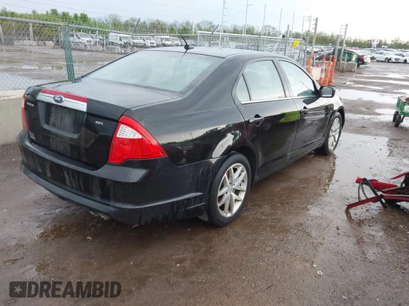 2011 Ford Fusion SEL with VIN 3FAHP0JA2BR209979, listed as a IAAI auction lot 42143065 with 185,192 mi miles and . Bid and sale history available at carsss.com. Image 4.