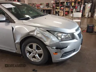 2013 Chevrolet Cruze 1LT with VIN 1G1PC5SB6D7314923, listed as a IAAI auction lot 42071232 with 105,918 mi miles and . Bid and sale history available at DreamBid. Image 6.