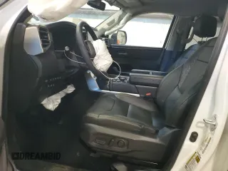 2023 Toyota Tundra Limited Hybrid with VIN 5TFJC5DB5PX015177, listed as a Copart auction lot 87896795 with 77,113 mi miles and Salvage title. Bid and sale history available at DreamBid. Image 7.