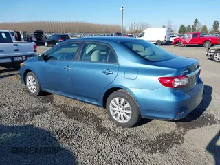 2013 Toyota Corolla L with VIN 5YFBU4EE2DP127014, listed as a IAAI auction lot 41729189 with 156,673 mi miles. Bid and sale history available at carsss.com. Image 3.