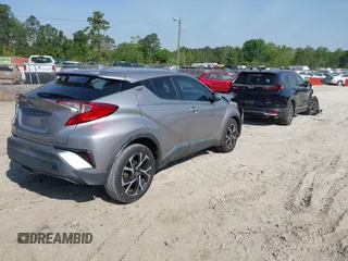 2018 Toyota C-HR XLE with VIN NMTKHMBX1JR026901, listed as a IAAI auction lot 42021943 with 78,217 mi miles and . Bid and sale history available at DreamBid. Image 4.