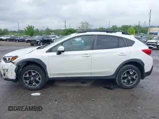 2018 Subaru Crosstrek Premium z VIN JF2GTACC5JH271335, wystawiony jako IAAI lot #42242097 z przebiegiem Nie podano mil oraz . Historia ofert i sprzedaży dostępna na DreamBid. Obrazek 13.