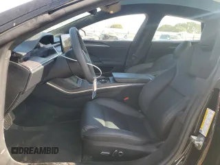 2023 Tesla Model S with VIN 5YJSA1E57PF507456, listed as a Copart auction lot 44649945 with 8,760 mi miles and Salvage title. Bid and sale history available at DreamBid. Image 7.