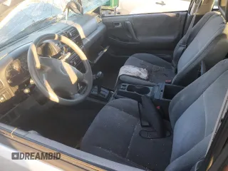 2000 Honda Passport LX with VIN 4S6CK58W7Y4416423, listed as a Copart auction lot 87708165 with 0 mi miles and Salvage Title. Bid and sale history available at carsss.com. Image 7.