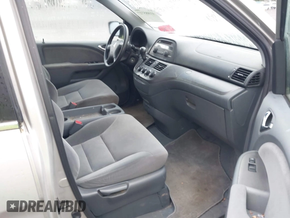 2005 Honda Odyssey LX with VIN 5FNRL382X5B029858, listed as a IAAI auction lot 41885727 with 228,607 mi miles. Bid and sale history available at carsss.com. Image 5.