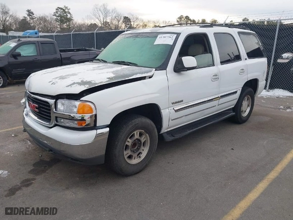 2002 GMC Yukon SLT with VIN 1GKEC13Z22J274962, listed as a IAAI auction lot 41387262 with 283,660 mi miles. Bid and sale history available at carsss.com. Image 2.