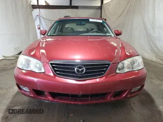 2001 Mazda Millenia S z VIN JM1TA222111707236, wystawiony jako Copart lot #54690874 z przebiegiem 107 530 mil mil oraz Szkody całkowita. Historia ofert i sprzedaży dostępna na DreamBid. Obrazek 5.