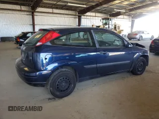 2004 Ford Focus ZX3 with VIN 3FAFP31Z44R127138, listed as a Copart auction lot 48397275 with 129,873 mi miles and Salvage title. Bid and sale history available at DreamBid. Image 3.