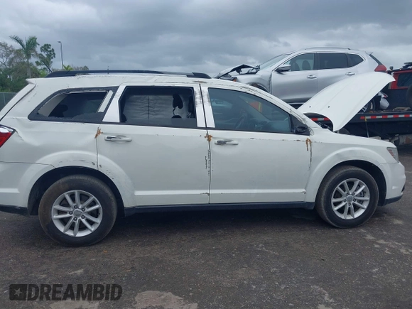 2017 Dodge Journey SXT with VIN 3C4PDDBG3HT592061, listed as a IAAI auction lot 38299155 with 127,856 mi miles and . Bid and sale history available at DreamBid. Image 6.