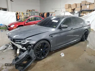 2021 BMW M5 z VIN WBS83CH04MCF76691, wystawiony jako Copart lot #39773233 z przebiegiem 35 821 mil mil oraz . Historia ofert i sprzedaży dostępna na DreamBid. Obrazek 1.