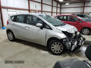 2015 Nissan Note S with VIN 3N1CE2CP7FL399569, listed as a Copart auction lot 58712605 with 131,049 mi miles and Salvage title. Bid and sale history available at DreamBid. Image 4.
