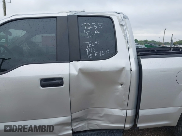 2015 Ford F-150 XL with VIN 1FTEX1C8XFKD19587, listed as a IAAI auction lot 42315673 with 220,319 mi miles and . Bid and sale history available at DreamBid. Image 6.