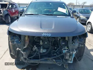 2015 Jeep Grand Cherokee Altitude with VIN 1C4RJEAG0FC952260, listed as a IAAI auction lot 41738692 with 124,197 mi miles. Bid and sale history available at carsss.com. Image 13.