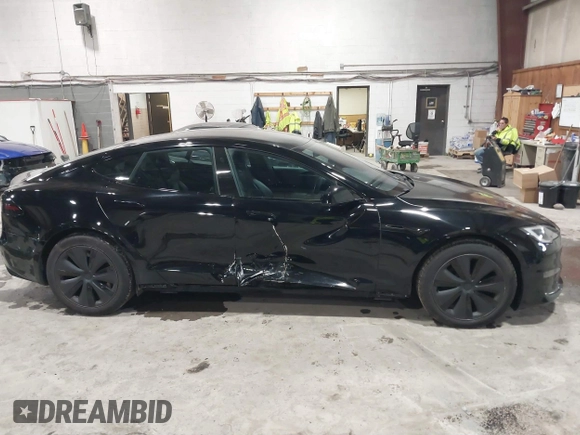 2022 Tesla Model S with VIN 5YJSA1E58NF478403, listed as a IAAI auction lot 41533099 with 42,779 mi miles and . Bid and sale history available at DreamBid. Image 13.