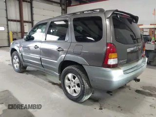 2002 Mazda Tribute LX with VIN 4F2CU08132KM39554, listed as a IAAI auction lot 42015060 with 99,128 mi miles and . Bid and sale history available at carsss.com. Image 3.