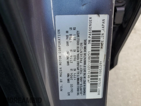 2005 Mazda 3 s with VIN JM1BK343051338251, listed as a Copart auction lot 54321465 with 106,183 mi miles and Salvage Title. Bid and sale history available at DreamBid. Image 12.