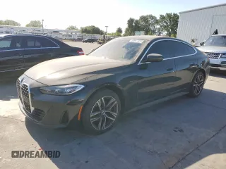 2023 BMW 4 Series 430i with VIN WBA63AV01PFP57025, listed as a Copart auction lot 60687025 with 28,514 mi miles and Salvage title. Bid and sale history available at DreamBid. Image 1.
