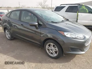 2017 Ford Fiesta SE z VIN 3FADP4BJ0HM157746, wystawiony jako IAAI lot #41775970 z przebiegiem 55 947 mil mil oraz . Historia ofert i sprzedaży dostępna na DreamBid. Obrazek 1.