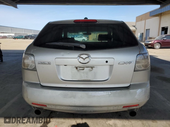2009 Mazda CX-7 Grand Touring z VIN JM3ER29L990226899, wystawiony jako Copart lot #50071505 z przebiegiem 167 124 mil mil oraz Szkoda całkowita • Salvage title. Historia ofert i sprzedaży dostępna na DreamBid. Obrazek 6.