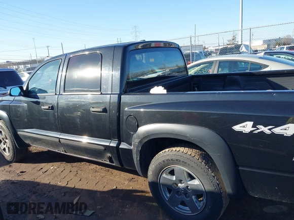 2006 Dodge Dakota SLT z VIN 1D7HW48K66S632826, wystawiony jako IAAI lot #41635407 z przebiegiem 208 046 mil mil oraz . Historia ofert i sprzedaży dostępna na DreamBid. Obrazek 15.