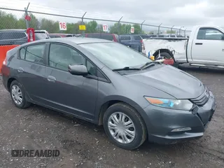 2010 Honda Insight LX with VIN JHMZE2H55AS041684, listed as a IAAI auction lot 42222564 with 296,830 mi miles and . Bid and sale history available at DreamBid. Image 1.