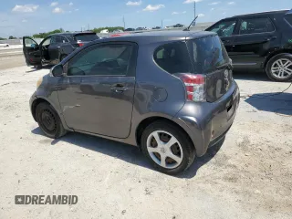 2012 Scion iQ with VIN JTNJJXB06CJ011117, listed as a Copart auction lot 52694345 with 94,547 mi miles and Salvage Title. Bid and sale history available at carsss.com. Image 2.