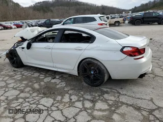 2015 BMW M6 z VIN WBS6C9C58FD467982, wystawiony jako Copart lot #78689983 z przebiegiem Nie podano mil oraz Szkody całkowita. Historia ofert i sprzedaży dostępna na DreamBid. Obrazek 2.