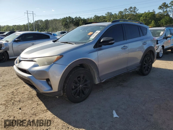 2018 Toyota RAV4 XLE with VIN 2T3RFREV5JW731373, listed as a Copart auction lot 51917465 with 124,623 mi miles and Salvage Title. Bid and sale history available at DreamBid. Image 1.